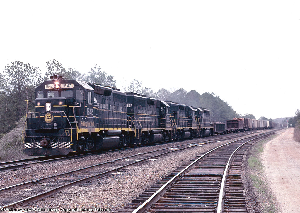 Seaboard Coast Line GP40-2 #1642, GP40's 1559 & 1521, and GP40-2 #1655 lead Atlanta bound train #322 